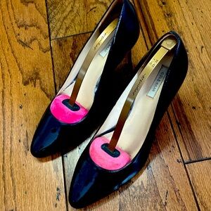 "Stylish Elegance: Black Patent Leather Stiletto Cole Haan Heels!"